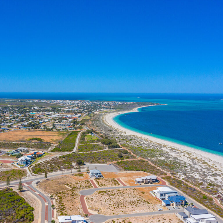 Aerial view of Jurien Bay with turquoise waters and coastal development (clone)